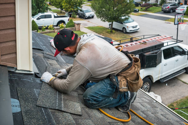 Professional Roofing technician working in Halltown, WV